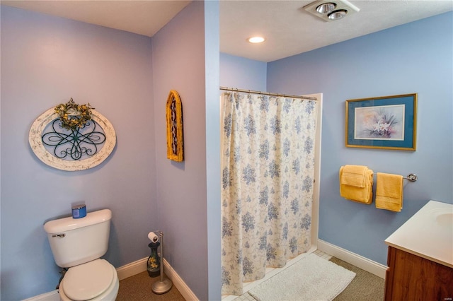 bathroom featuring visible vents, toilet, a shower with shower curtain, and baseboards