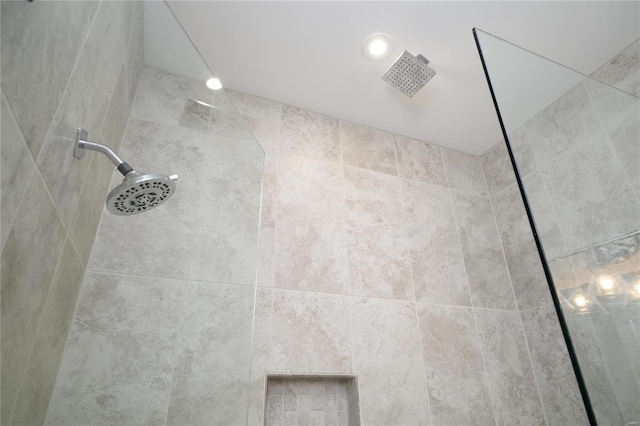 room details with a tile shower