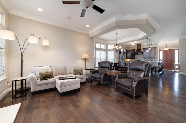 living area featuring baseboards, ornamental molding, and dark wood-style flooring