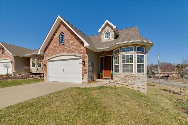 view of front of property with brick siding, roof with shingles, concrete driveway, and a front yard