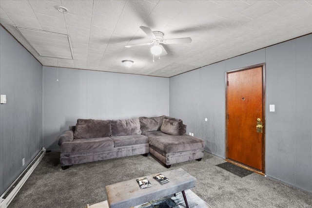 carpeted living area featuring baseboard heating and ceiling fan