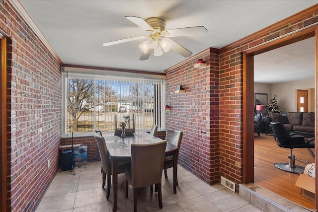 interior space with a ceiling fan