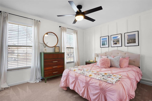 bedroom featuring baseboards, carpet, and a ceiling fan