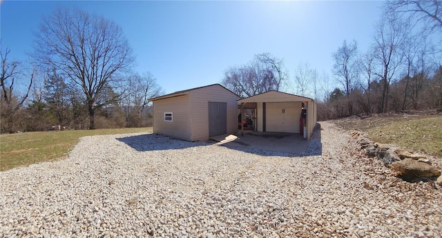 view of outbuilding featuring an outdoor structure