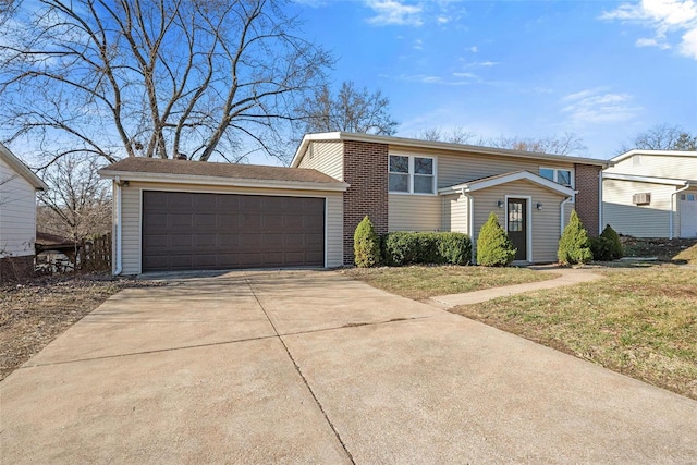 traditional-style house featuring a detached garage