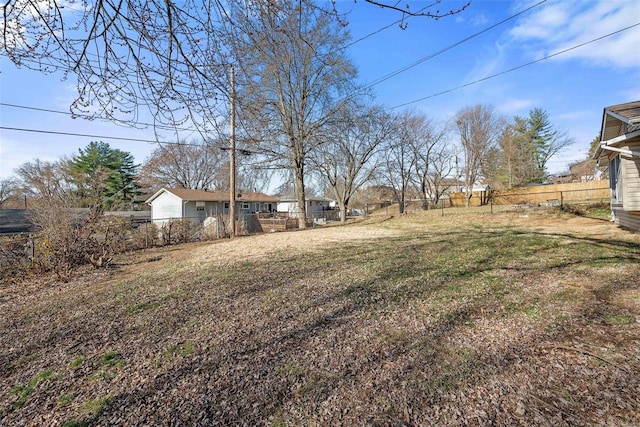 view of yard featuring fence