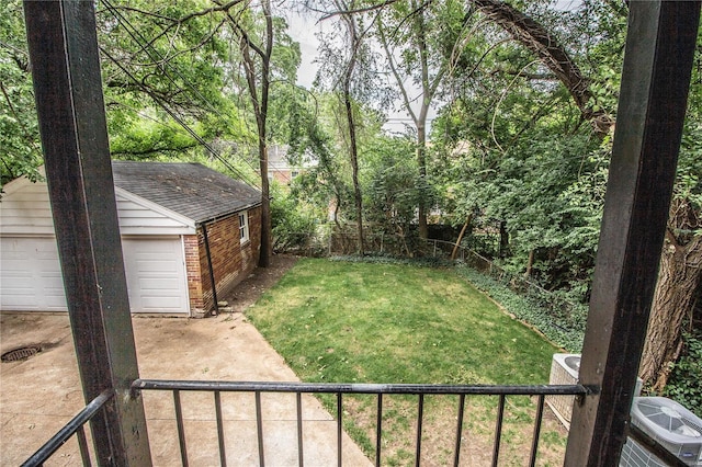 view of yard with an outdoor structure and fence