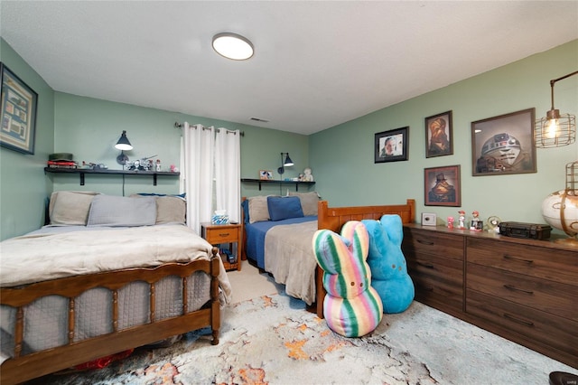 bedroom featuring visible vents and carpet floors