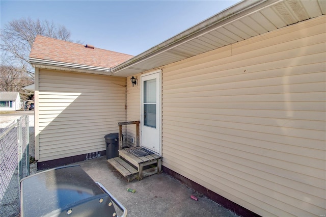 view of patio / terrace featuring fence