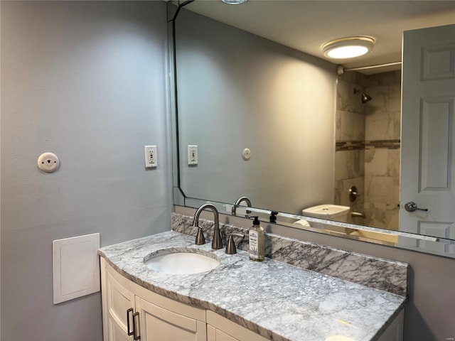 bathroom featuring vanity and walk in shower