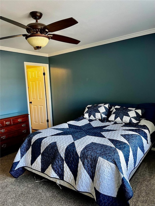 bedroom with carpet floors, a ceiling fan, and ornamental molding