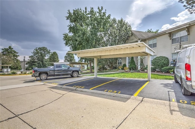 view of partially covered parking lot