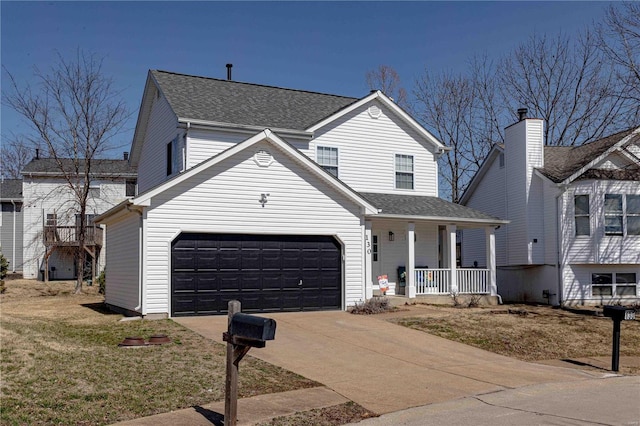 traditional-style house featuring covered porch, an attached garage, concrete driveway, and a shingled roof