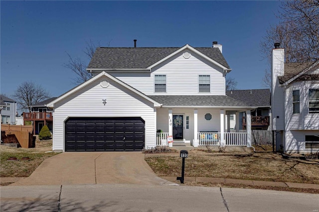 traditional-style home with an attached garage, roof with shingles, covered porch, and driveway