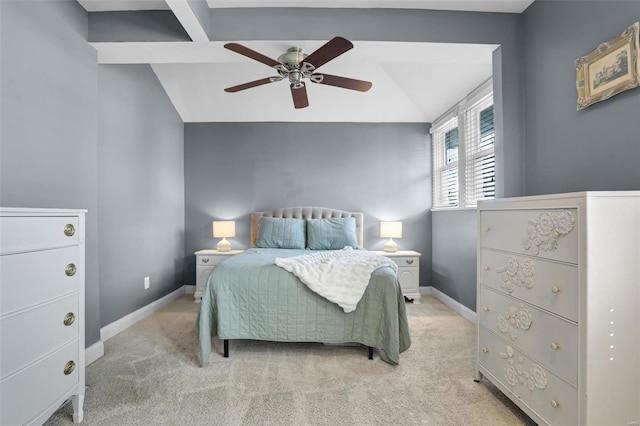 bedroom with light colored carpet, a ceiling fan, lofted ceiling, and baseboards