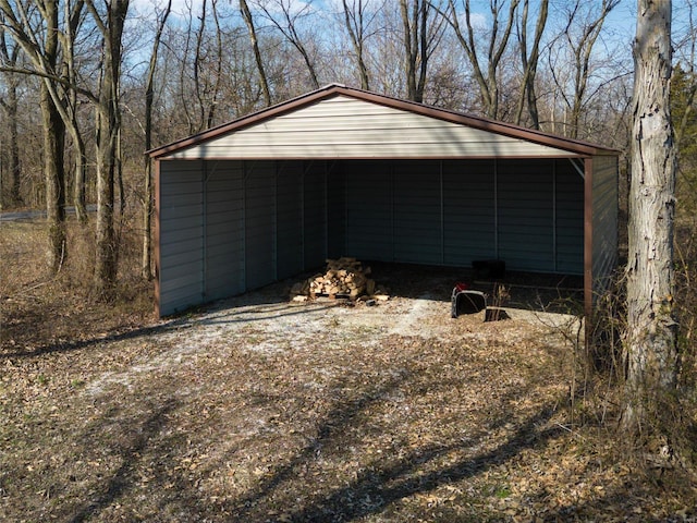 garage with a detached carport