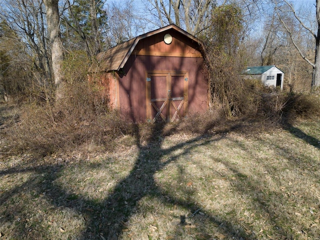 view of outbuilding featuring an outdoor structure