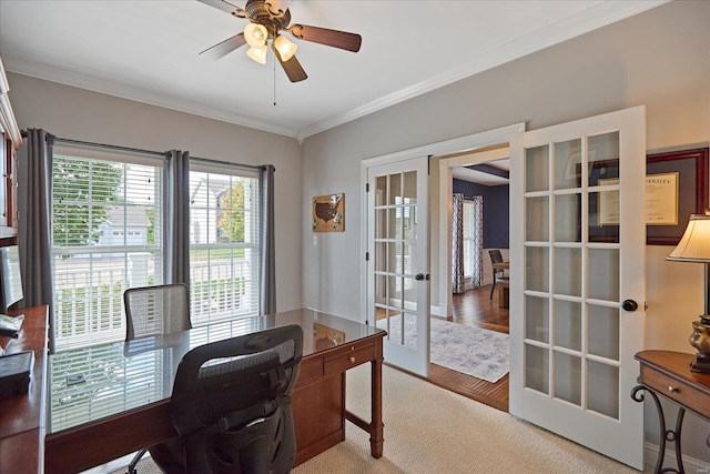 office with french doors, crown molding, and ceiling fan