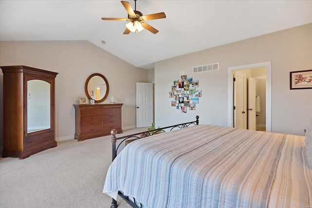 bedroom with a ceiling fan, baseboards, visible vents, vaulted ceiling, and light carpet