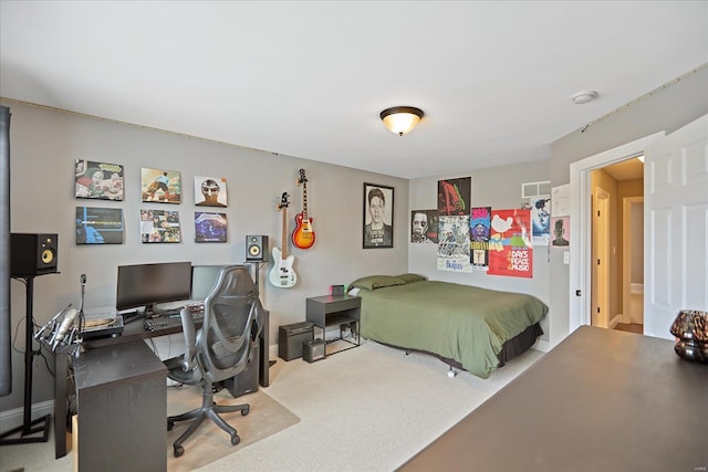 bedroom with carpet, visible vents, and baseboards