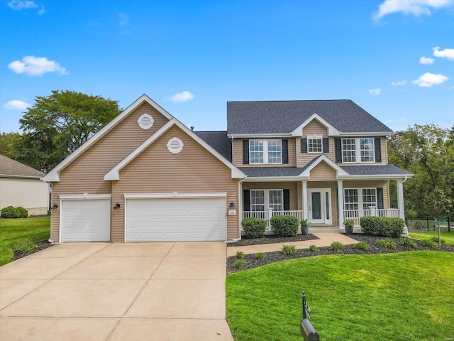 view of front of house with an attached garage, a porch, concrete driveway, and a front yard