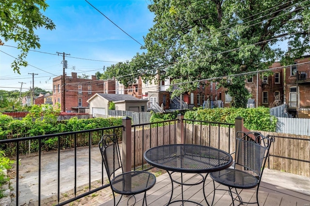 wooden deck featuring fence