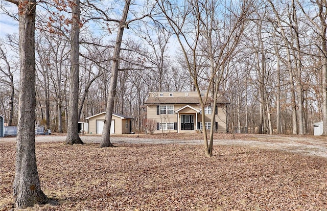 view of front of property with an outbuilding