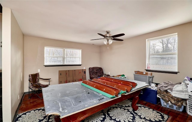 bedroom with ceiling fan and wood finished floors