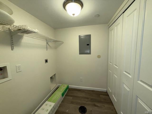 clothes washing area with dark wood-type flooring, electric panel, laundry area, hookup for a washing machine, and hookup for an electric dryer