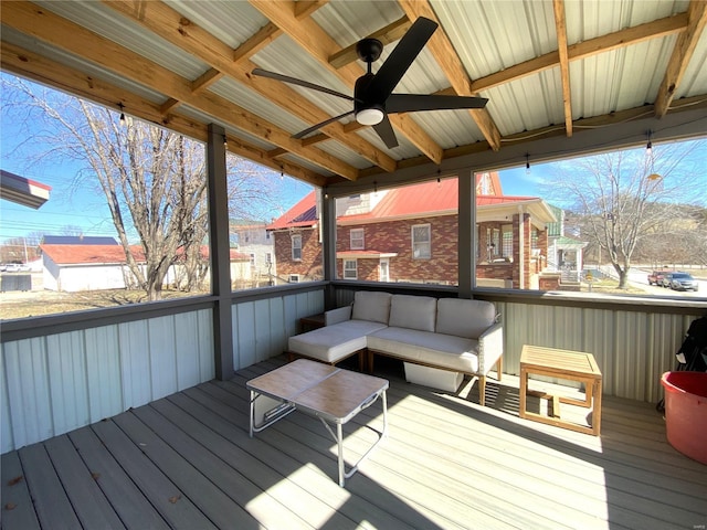 wooden terrace featuring an outdoor hangout area and a ceiling fan