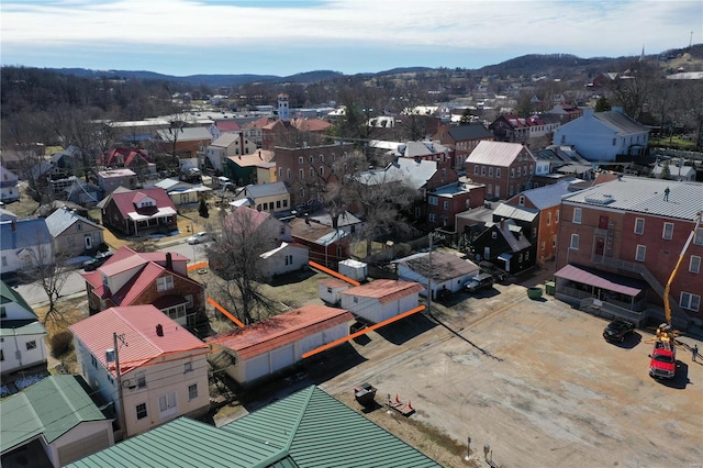 aerial view featuring a mountain view and a residential view