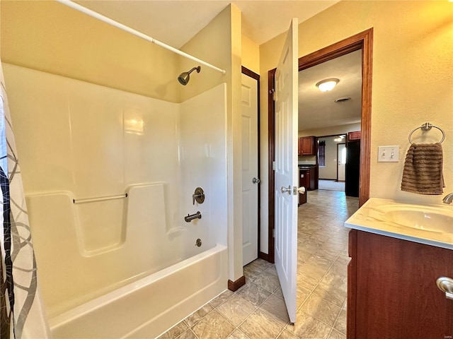 full bath with vanity and shower / bathing tub combination