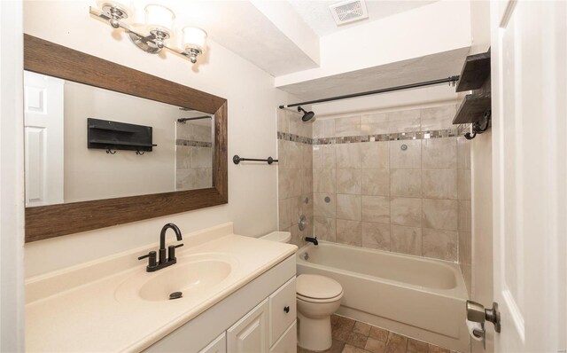 full bath with visible vents, toilet, vanity, and shower / bathing tub combination