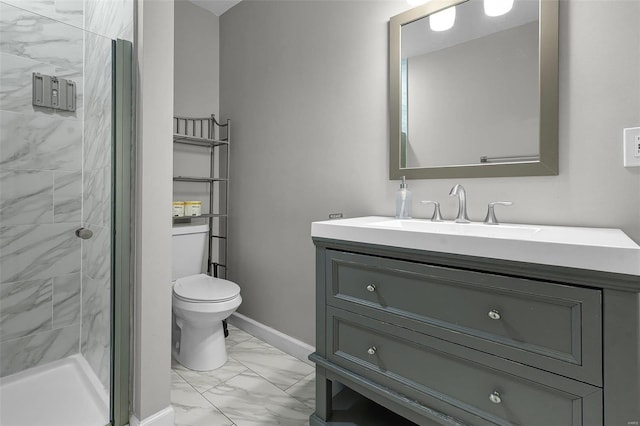 bathroom with a shower stall, baseboards, toilet, marble finish floor, and vanity