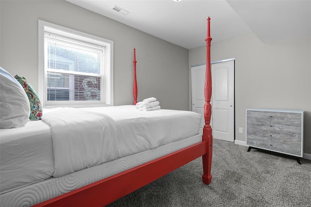 bedroom with carpet flooring, baseboards, and visible vents