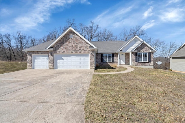 ranch-style home featuring an attached garage, concrete driveway, and a front yard