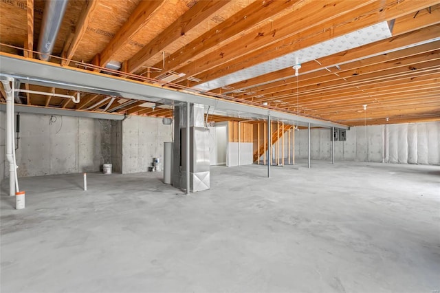 unfinished basement with heating unit