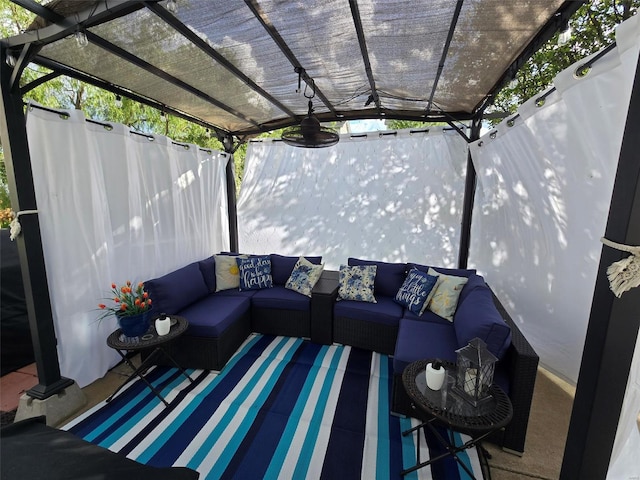 view of patio featuring an outdoor living space, fence, and a pergola