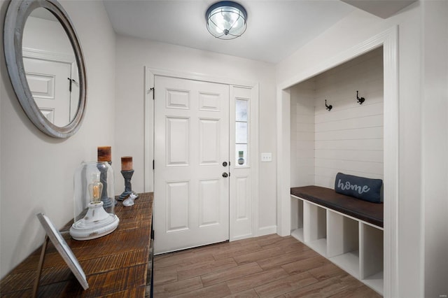 mudroom with wood finished floors