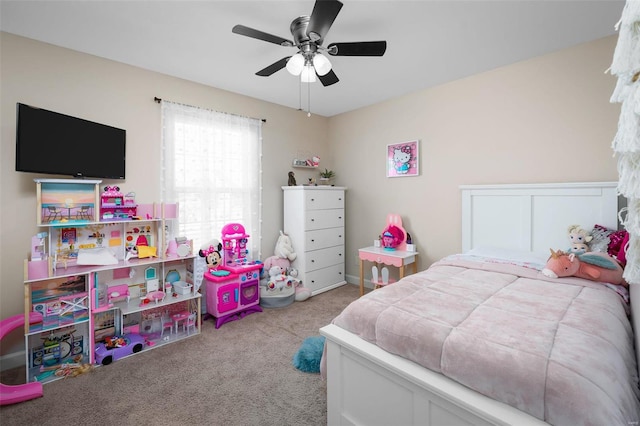 carpeted bedroom with a ceiling fan