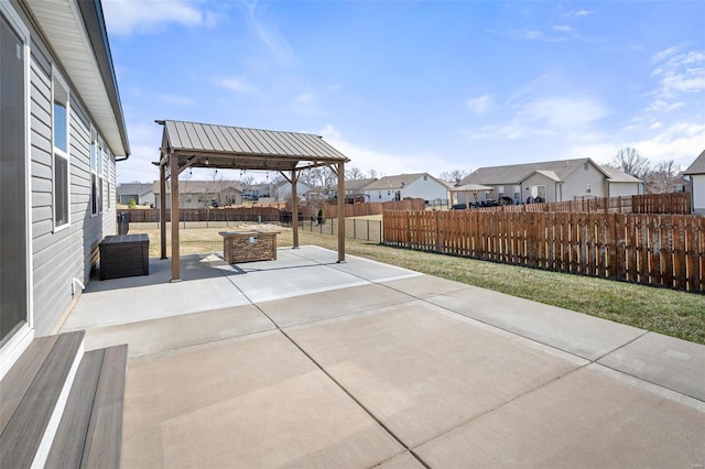 view of patio / terrace featuring fence private yard and a residential view