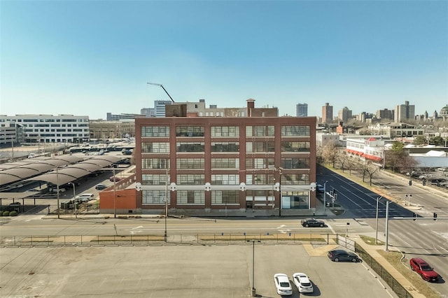 view of building exterior featuring a view of city