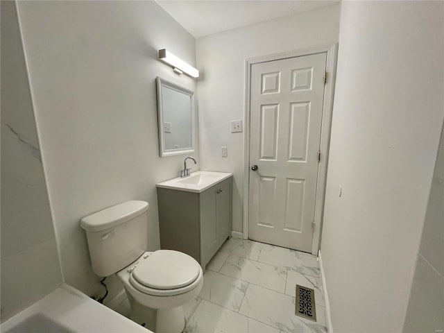 bathroom featuring visible vents, baseboards, toilet, marble finish floor, and vanity