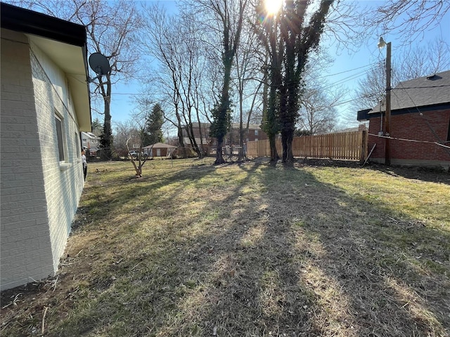 view of yard featuring fence