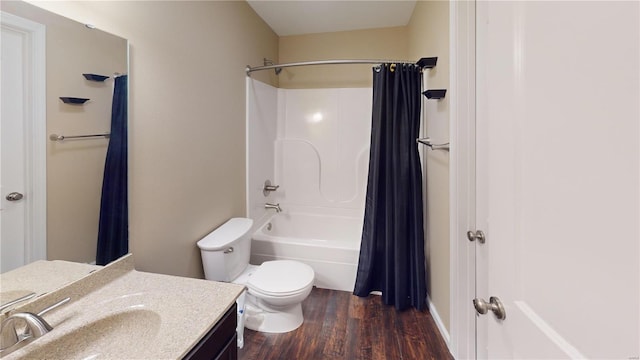 bathroom featuring vanity, shower / bath combination with curtain, toilet, and wood finished floors