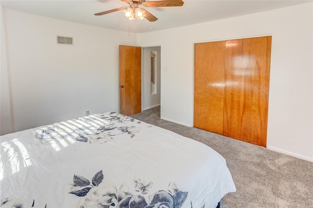 bedroom featuring visible vents, ceiling fan, baseboards, and carpet