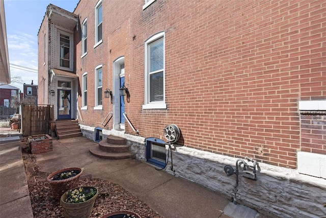 view of home's exterior featuring brick siding