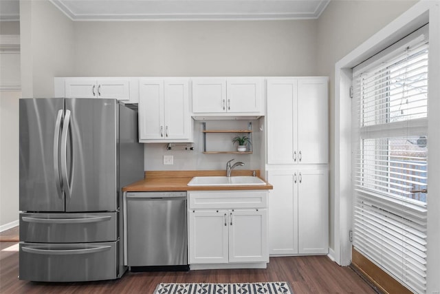 kitchen with dark wood-style floors, open shelves, a sink, stainless steel appliances, and white cabinets