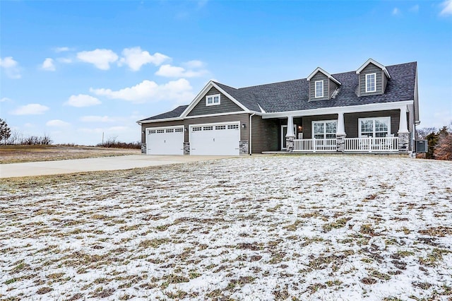 view of front of house featuring cooling unit, a porch, and driveway