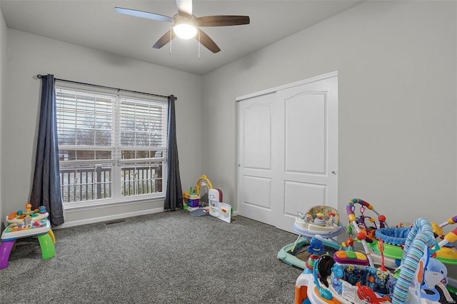 playroom with visible vents, ceiling fan, and carpet floors